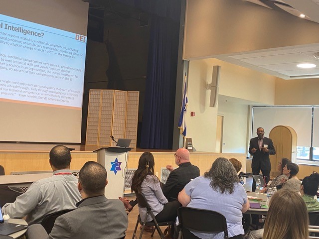 Estrus Tucker, President & CEO, DEIC Consultants LLC speaks to attendees at the Rhode to Equity Conference